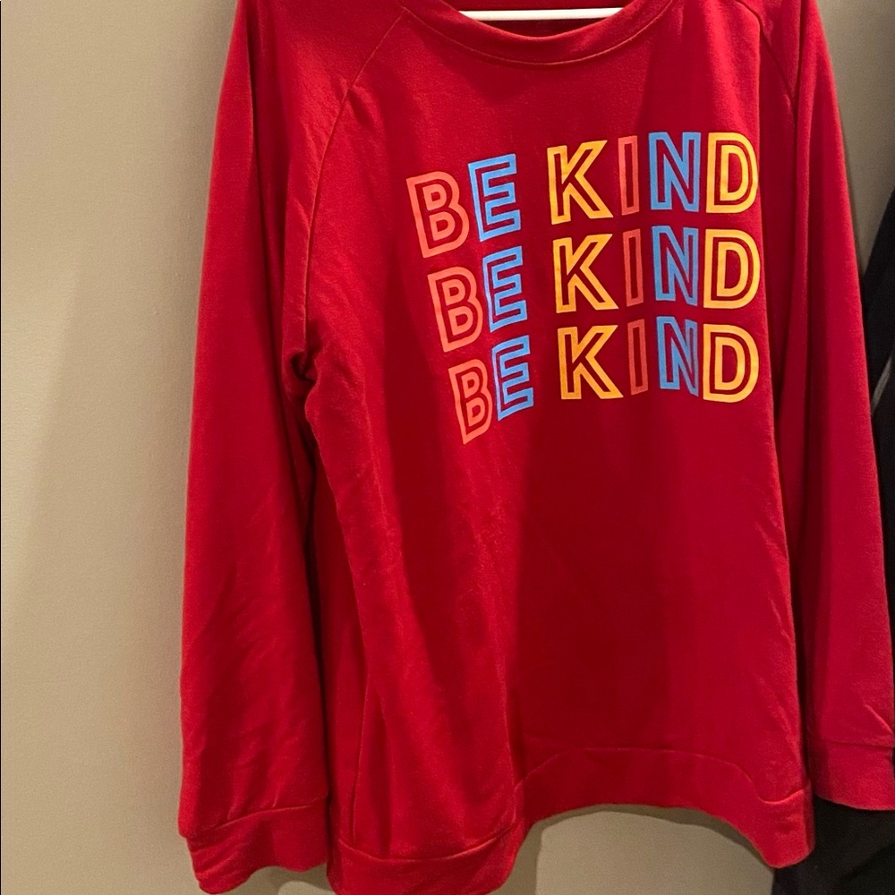 Be Kind crew neck sweatshirt.
